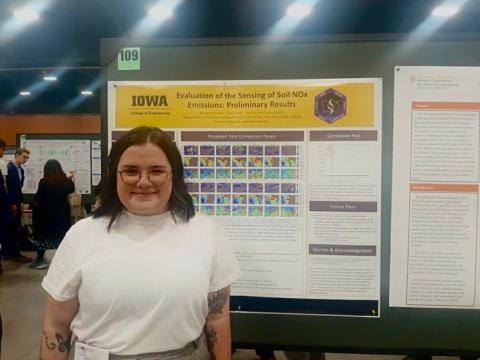 Margaret Praska poses with her poster